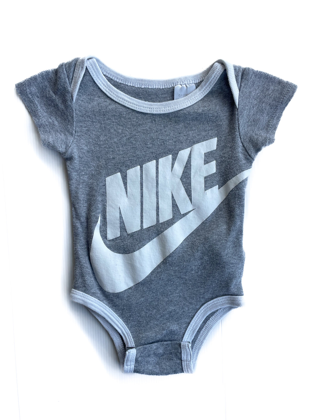 Nike bodysuit (0-6M)
